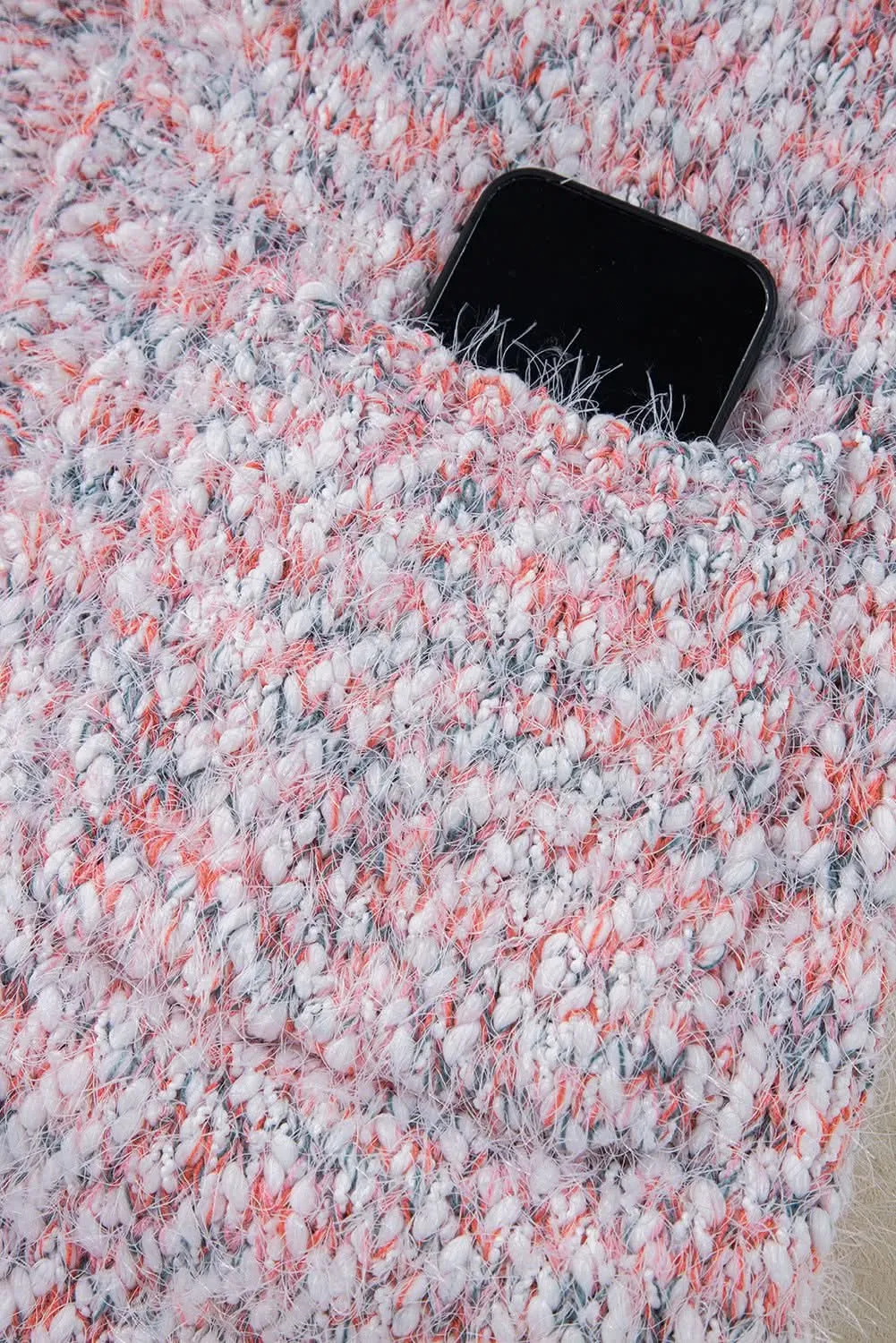 Trendy pink confetti cardigan for layering